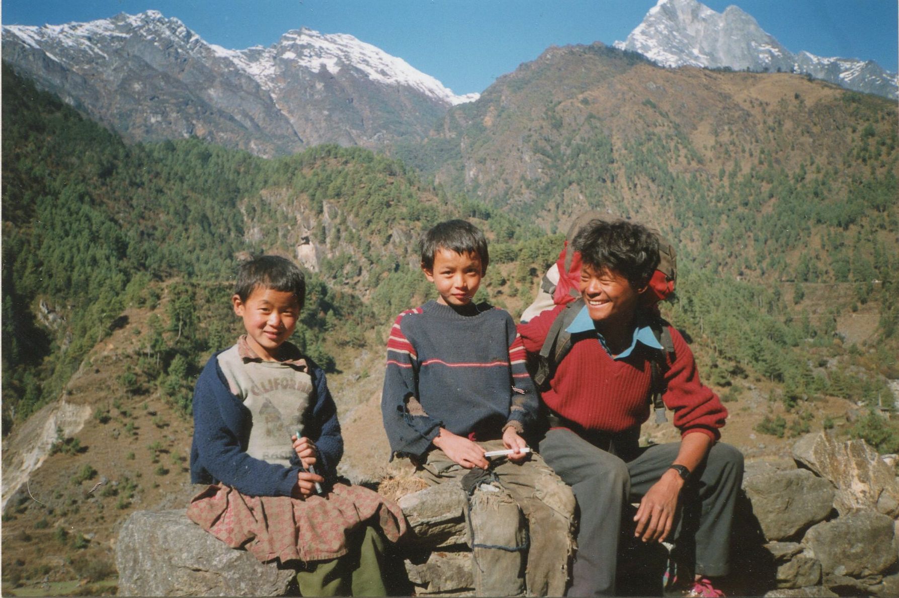 Nima Lakpa Sherpa trekking guide with two young Sherpas