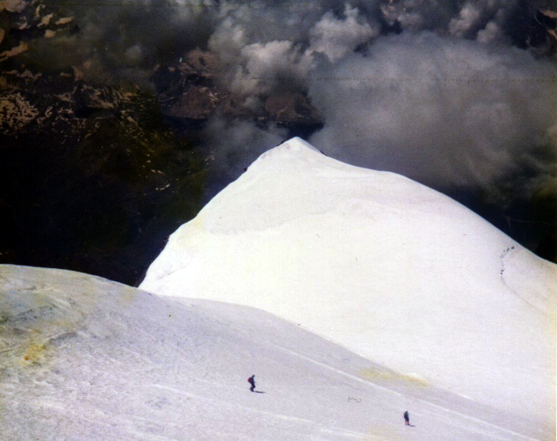 Descent from Grand Combin