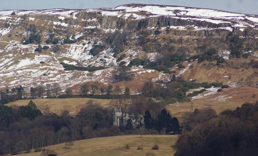 Overtoun House beneath the Lang Craigs on Kilpatrick Hills