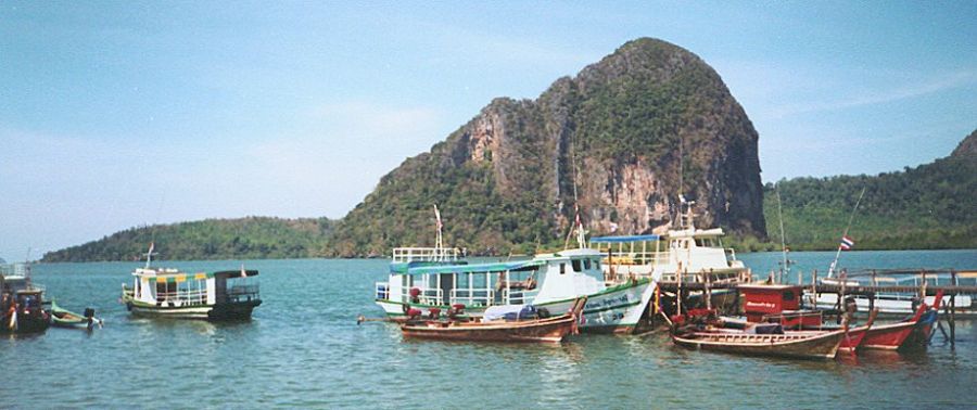 Boats at pier at Ban Pak Meng in Trang province in Southern Thailand