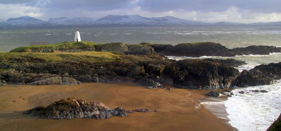 Hills of Snowdonia from Ynys Llanddwyn on Anglesey